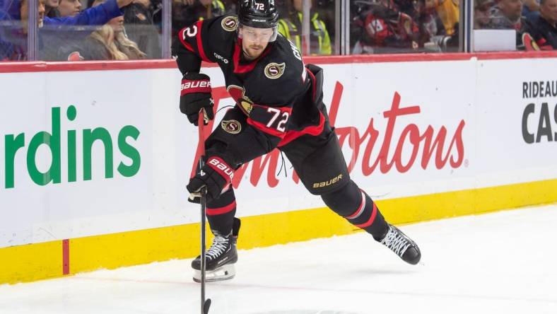 Jan 29, 2024; Ottawa, Ontario, CAN; Ottawa Senators defenseman Thomas Chabot (72) skates with the puck in the second period against the Nashville Predators at the Canadian Tire Centre. Mandatory Credit: Marc DesRosiers-USA TODAY Sports