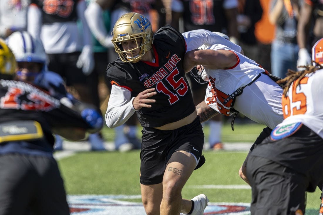 At the Senior Bowl, defensive end Laiatu Latu of UCLA (15) attempted to solidify his pre-draft status as a first-round talent. Mandatory Credit: Vasha Hunt-USA TODAY Sports