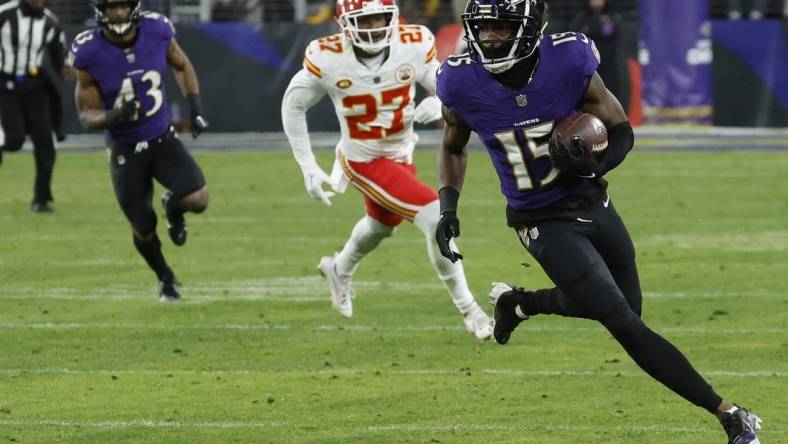 Jan 28, 2024; Baltimore, Maryland, USA; Baltimore Ravens wide receiver Nelson Agholor (15) runs with the ball against the Kansas City Chiefs in the AFC Championship football game at M&T Bank Stadium. Mandatory Credit: Geoff Burke-USA TODAY Sports