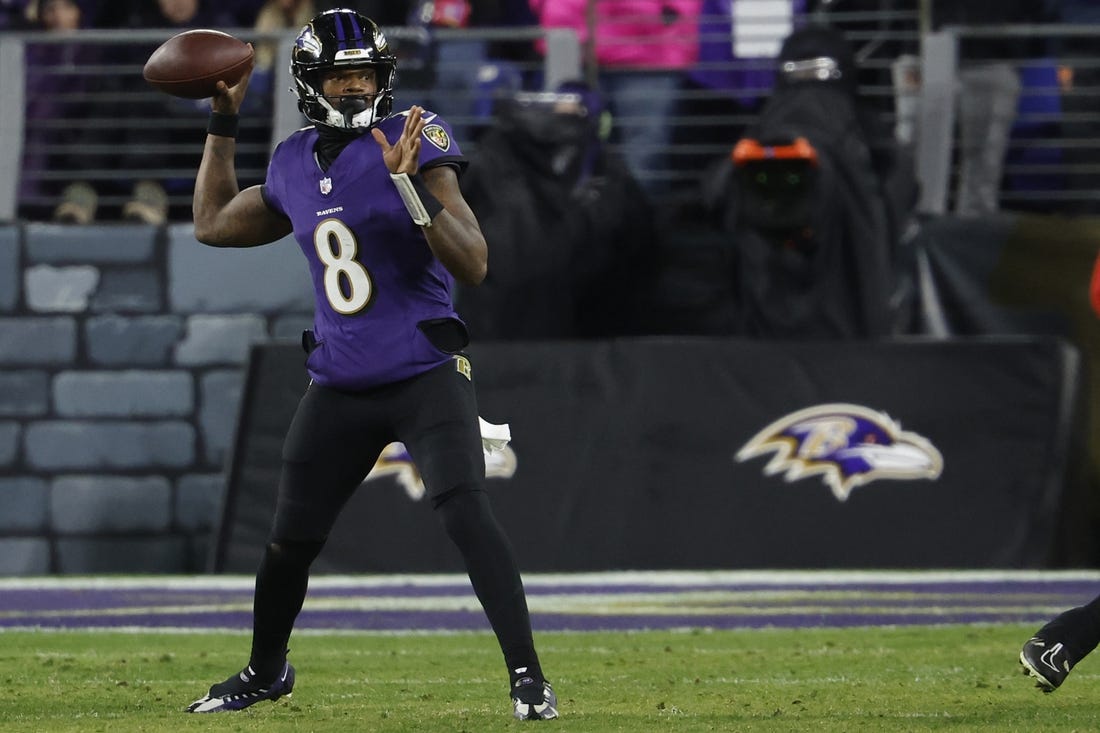 Jan 28, 2024; Baltimore, Maryland, USA; Baltimore Ravens quarterback Lamar Jackson (8) passes the ball against the Kansas City Chiefs in the AFC Championship football game at M&T Bank Stadium. Mandatory Credit: Geoff Burke-USA TODAY Sports