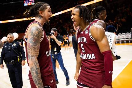 South Carolina guard Myles Stute (10) and South Carolina guard Meechie Johnson (5) celebrate their win after a basketball game between Tennessee and South Carolina held at Thompson-Boling Arena at Food City Center on Tuesday, January 30, 2024.
