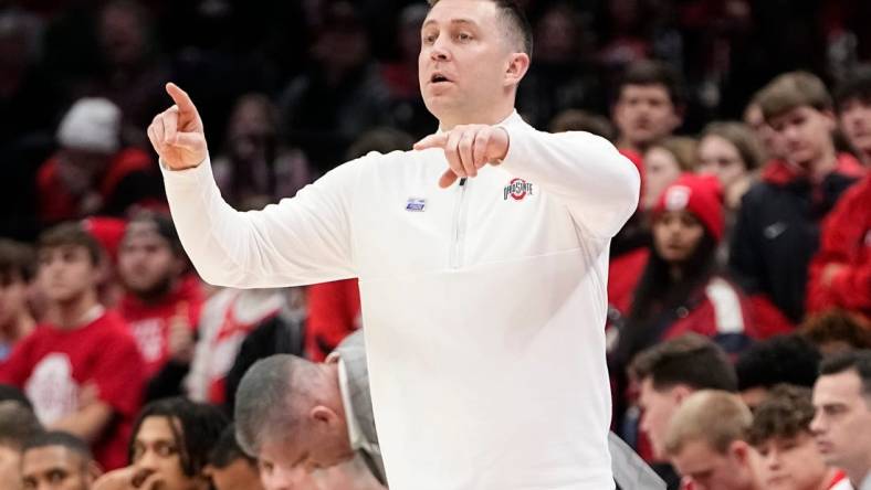 Feb 1, 2024; Columbus, Ohio, USA; Ohio State Buckeyes assistant coach Jake Diebler motions during the first half of the NCAA men   s basketball game against the Illinois Fighting Illini at Value City Arena.
