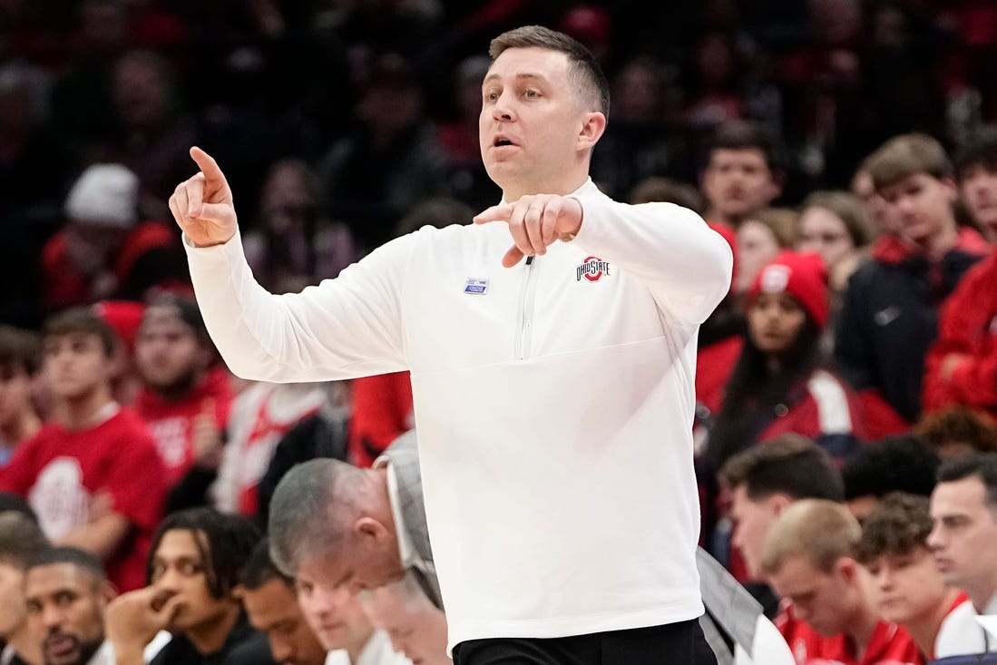 Feb 1, 2024; Columbus, Ohio, USA; Ohio State Buckeyes assistant coach Jake Diebler motions during the first half of the NCAA men   s basketball game against the Illinois Fighting Illini at Value City Arena.