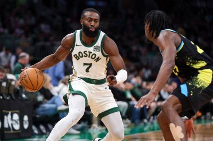 Jan 30, 2024; Boston, Massachusetts, USA; Boston Celtics forward Jaylen Brown (7) drives to the basket during the second half against the Indiana Pacers at TD Garden. Mandatory Credit: Paul Rutherford-USA TODAY Sports