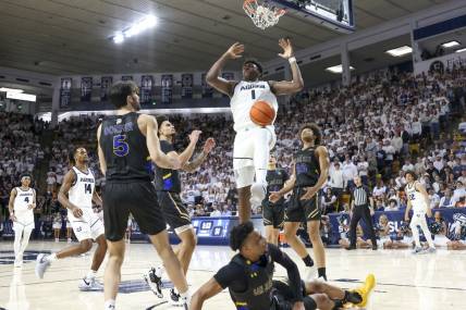Jan 30, 2024; Logan, Utah, USA; Utah State Aggies forward Great Osobor (1) dunks the ball against the San Jose State Spartans during the second half at Dee Glen Smith Spectrum. Mandatory Credit: Rob Gray-USA TODAY Sports