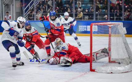 Jan 31, 2024; Gangwon-do, KOR; Mikey Berchild (USA) strikes the puck past goalkeeper Jan Larys (CZE) to score a goal and make it 0-3 in the Ice Hockey Men s 6-on-6 Tournament Gold Medal Game between Czech Republic and (USA) at the Gangneung Hockey Centre. The Winter Youth Olympic Games, Gangwon, South Korea, Wednesday 31 January 2024. Mandatory Credit: OIS/Joe Marklund-USA TODAY Sports