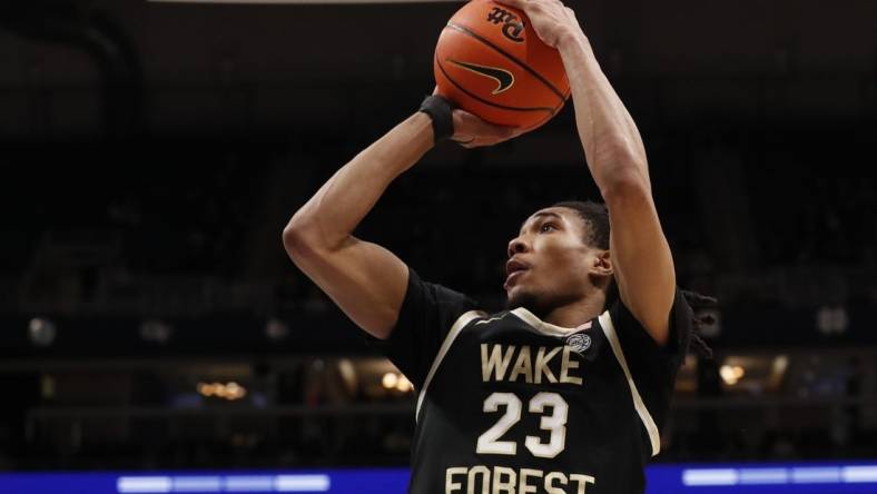 Jan 31, 2024; Pittsburgh, Pennsylvania, USA; Wake Forest Demon Deacons guard Hunter Sallis (23) shoots against the Pittsburgh Panthers during the second half at the Petersen Events Center. Pittsburgh won 77-72.  Mandatory Credit: Charles LeClaire-USA TODAY Sports