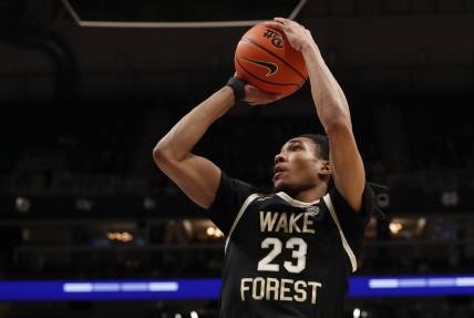 Jan 31, 2024; Pittsburgh, Pennsylvania, USA; Wake Forest Demon Deacons guard Hunter Sallis (23) shoots against the Pittsburgh Panthers during the second half at the Petersen Events Center. Pittsburgh won 77-72.  Mandatory Credit: Charles LeClaire-USA TODAY Sports