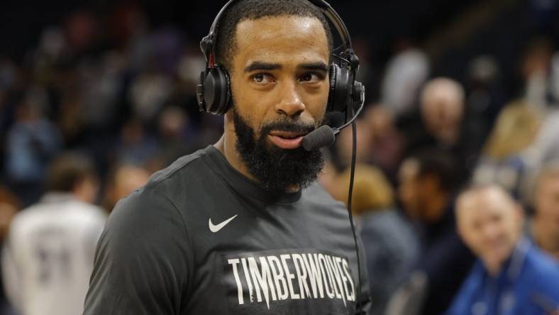 Jan 31, 2024; Minneapolis, Minnesota, USA; Minnesota Timberwolves guard Mike Conley (10) takes part in an interview after defeating the Dallas Mavericks at Target Center. Mandatory Credit: Bruce Kluckhohn-USA TODAY Sports