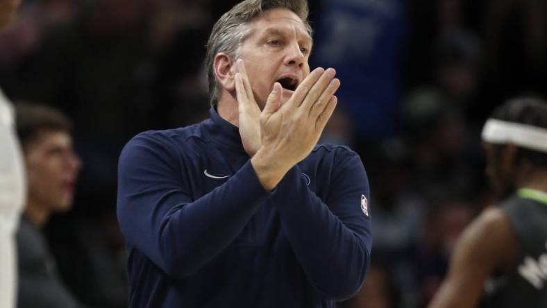 Jan 31, 2024; Minneapolis, Minnesota, USA; Minnesota Timberwolves head coach Chris Finch directs his team as they play the Dallas Mavericks in the first quarter at Target Center. Mandatory Credit: Bruce Kluckhohn-USA TODAY Sports