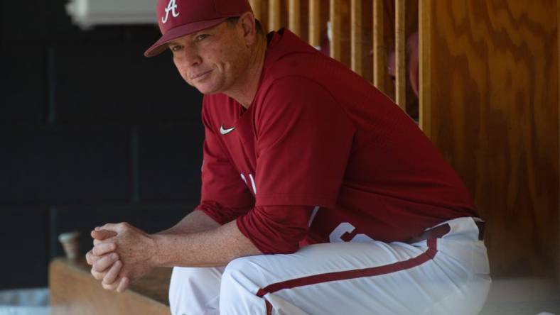 Alabama baseball coach Brad Bohannon sits on the bench before this team's game against Texas A&M at Sewell-Thomas Stadium, Sunday, April 3, 2022.