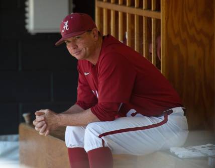 Alabama baseball coach Brad Bohannon sits on the bench before this team's game against Texas A&M at Sewell-Thomas Stadium, Sunday, April 3, 2022.