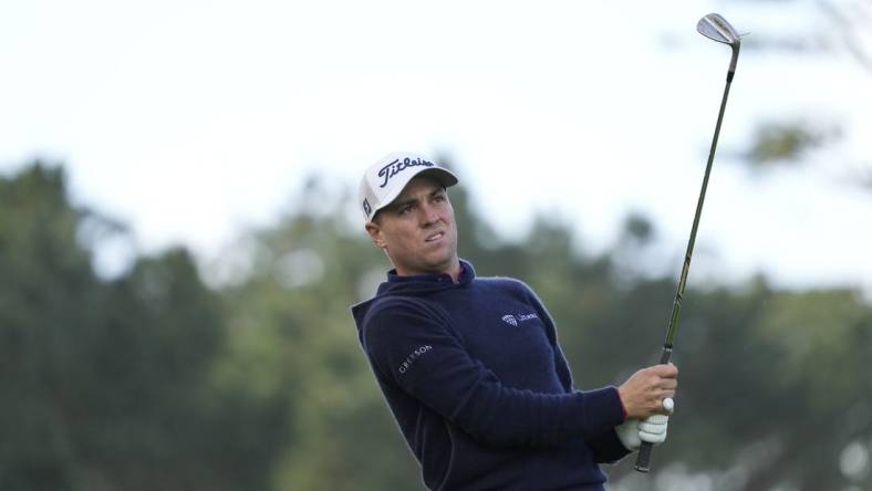 Feb 1, 2024; Pebble Beach, California, USA; Justin Thomas hits his fairway shot on the 10th hole during the first round of the AT&T Pebble Beach Pro-Am golf tournament at Spyglass Hill Golf Course. Mandatory Credit: Michael Madrid-USA TODAY Sports