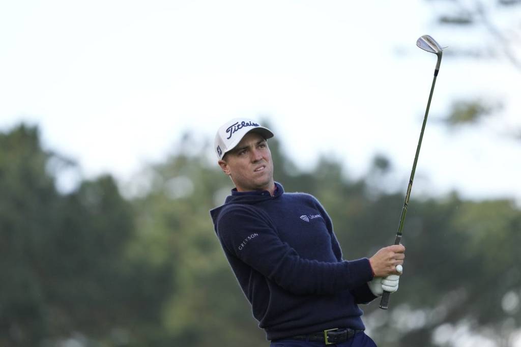 Feb 1, 2024; Pebble Beach, California, USA; Justin Thomas hits his fairway shot on the 10th hole during the first round of the AT&T Pebble Beach Pro-Am golf tournament at Spyglass Hill Golf Course. Mandatory Credit: Michael Madrid-USA TODAY Sports