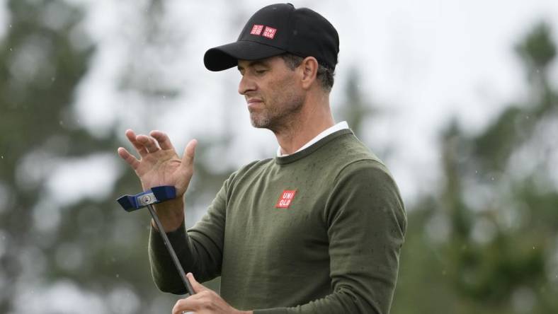 Feb 1, 2024; Pebble Beach, California, USA; Adam Scott reacts after his putt on the 10th hole during the first round of the AT&T Pebble Beach Pro-Am golf tournament at Spyglass Hill Golf Course. Mandatory Credit: Michael Madrid-USA TODAY Sports