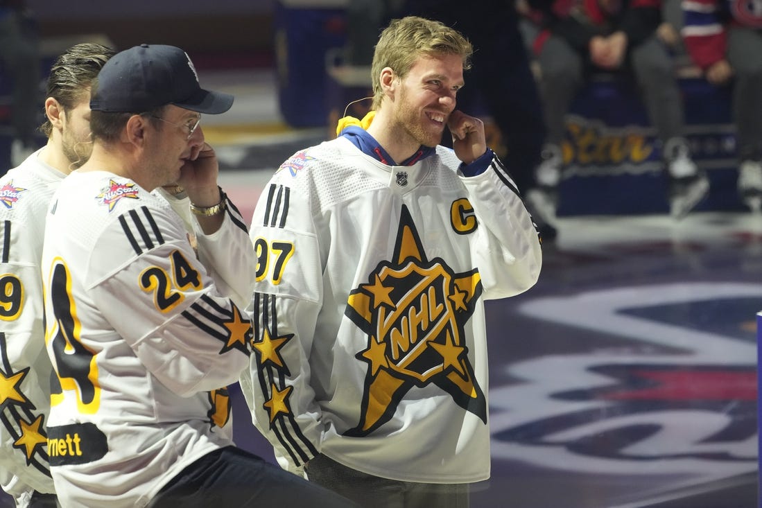 Feb 1, 2024; Toronto, Ontario, CANADA; Actor Will Arnett (left) and Team McDavid captain Connor McDavid (right) during the NHL All-Star Player Draft on NHL All-Star Thursday at Scotiabank Arena. Mandatory Credit: John E. Sokolowski-USA TODAY Sports