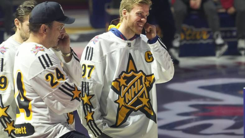 Feb 1, 2024; Toronto, Ontario, CANADA; Actor Will Arnett (left) and Team McDavid captain Connor McDavid (right) during the NHL All-Star Player Draft on NHL All-Star Thursday at Scotiabank Arena. Mandatory Credit: John E. Sokolowski-USA TODAY Sports