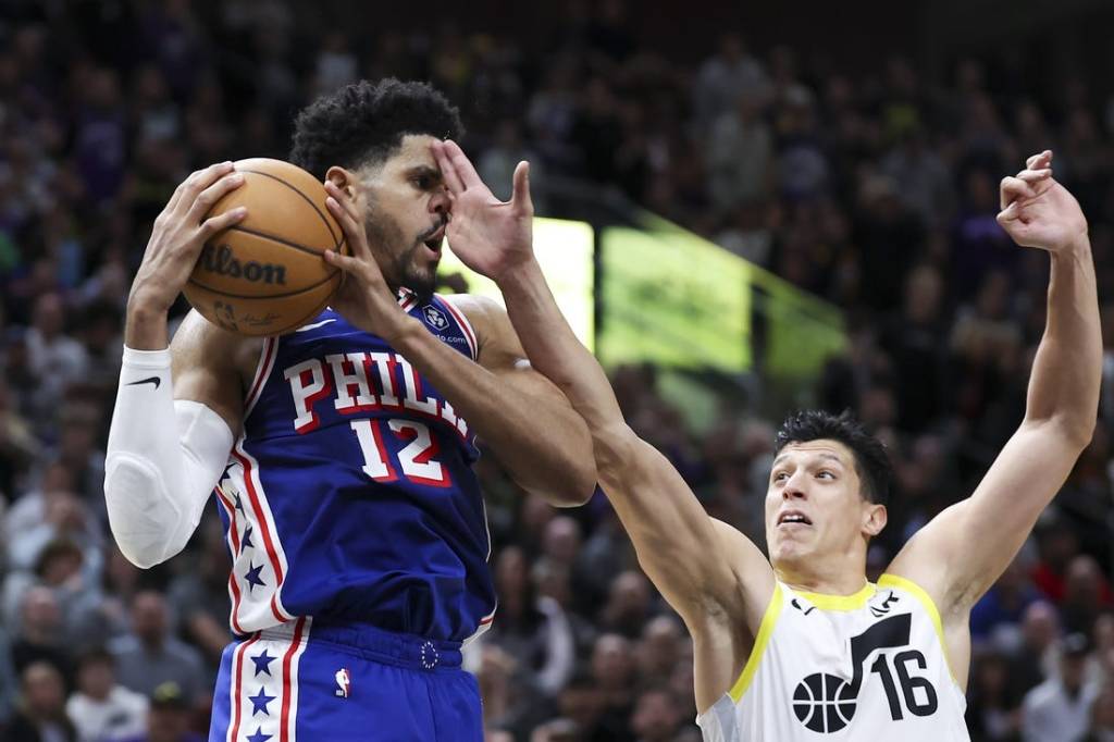 Feb 1, 2024; Salt Lake City, Utah, USA; Philadelphia 76ers forward Tobias Harris (12) is fouled by Utah Jazz forward Simone Fontecchio (16) during the fourth quarter at Delta Center. Mandatory Credit: Rob Gray-USA TODAY Sports