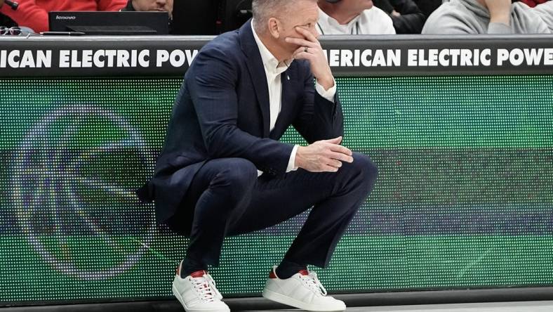 Nov 15, 2023; Columbus, OH, USA; Ohio State Buckeyes head coach Chris Holtmann reacts during the second half of the NCAA men   s basketball game against the Merrimack College Warriors at Value City Arena. Ohio State won 76-52.