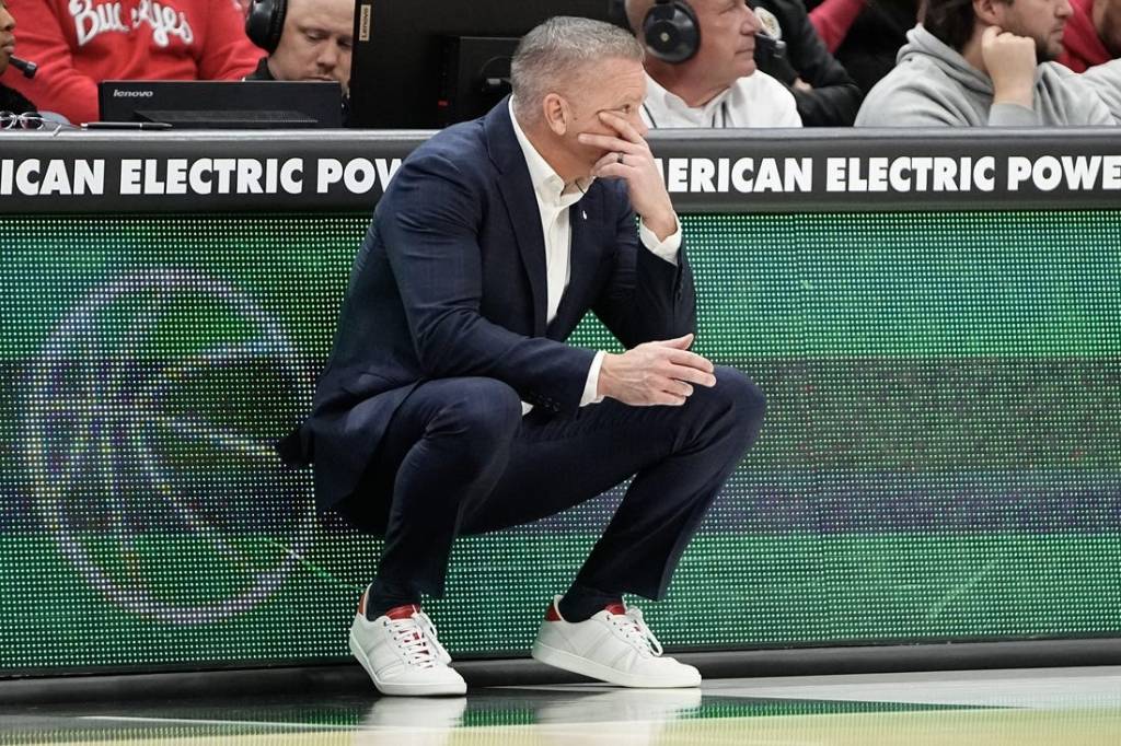 Nov 15, 2023; Columbus, OH, USA; Ohio State Buckeyes head coach Chris Holtmann reacts during the second half of the NCAA men   s basketball game against the Merrimack College Warriors at Value City Arena. Ohio State won 76-52.