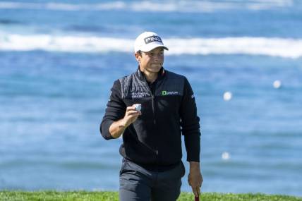 February 2, 2024; Pebble Beach, California, USA; Viktor Hovland acknowledges the crowd after making his putt on the fifth hole during the second round of the AT&T Pebble Beach Pro-Am golf tournament at Pebble Beach Golf Links. Mandatory Credit: Kyle Terada-USA TODAY Sports