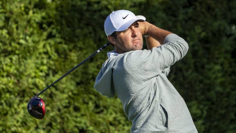 February 2, 2024; Pebble Beach, California, USA; Scottie Scheffler  hits his tee shot on the 16th hole during the second round of the AT&T Pebble Beach Pro-Am golf tournament at Pebble Beach Golf Links. Mandatory Credit: Kyle Terada-USA TODAY Sports