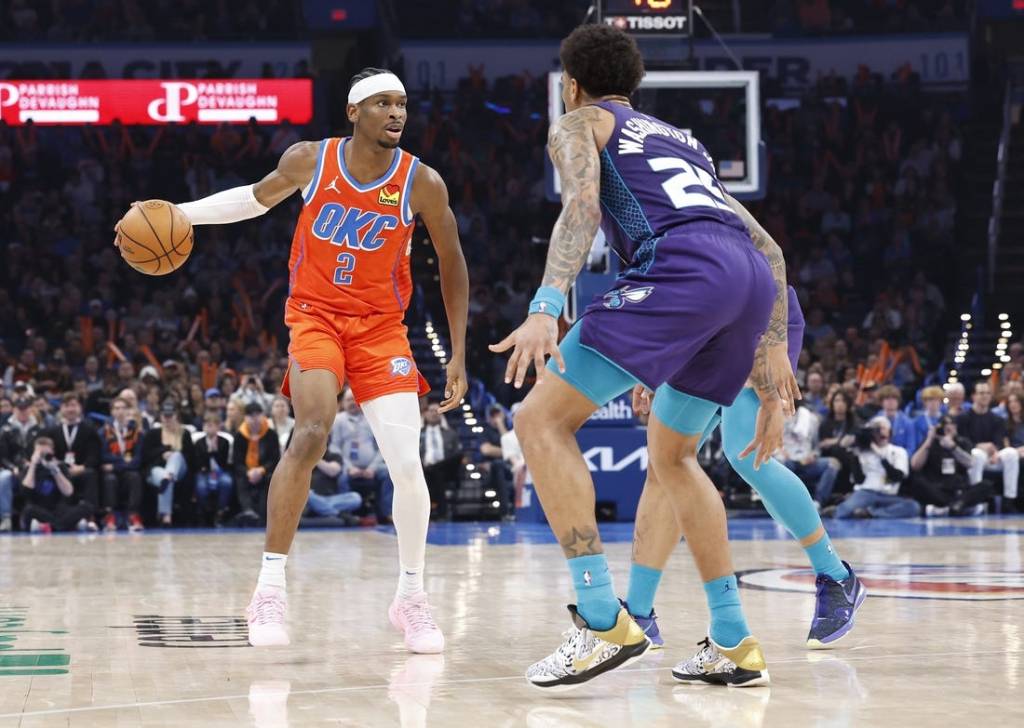 Feb 2, 2024; Oklahoma City, Oklahoma, USA; Oklahoma City Thunder guard Shai Gilgeous-Alexander (2) moves down the court against Charlotte Hornets forward P.J. Washington (25) during the second quarter at Paycom Center. Mandatory Credit: Alonzo Adams-USA TODAY Sports