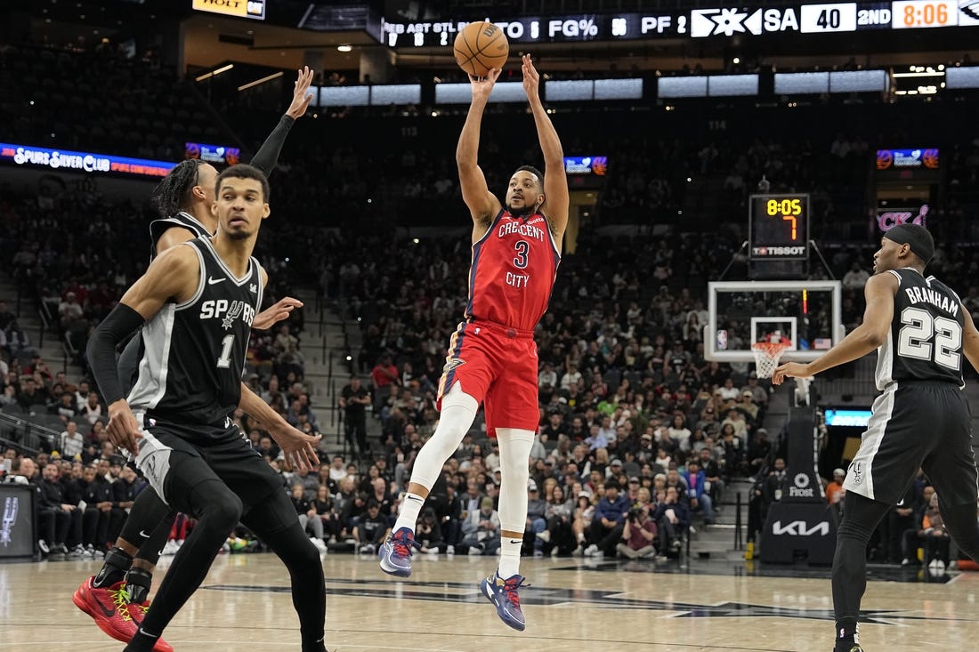 Feb 2, 2024; San Antonio, Texas, USA; New Orleans Pelicans guard CJ McCollum (3) shoots during the first half against the San Antonio Spurs at Frost Bank Center. Mandatory Credit: Scott Wachter-USA TODAY Sports