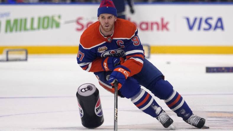 Feb 2, 2024; Toronto, Ontario, CANADA; Edmonton Oilers center Connor McDavid (97) competes in the obstacle course during the NHL All-Star Skills Competition at Scotiabank Arena. Mandatory Credit: John E. Sokolowski-USA TODAY Sports