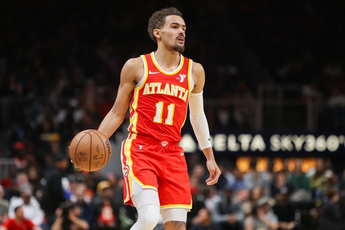 Feb 2, 2024; Atlanta, Georgia, USA; Atlanta Hawks guard Trae Young (11) dribbles against the Phoenix Suns in the second half at State Farm Arena. Mandatory Credit: Brett Davis-USA TODAY Sports