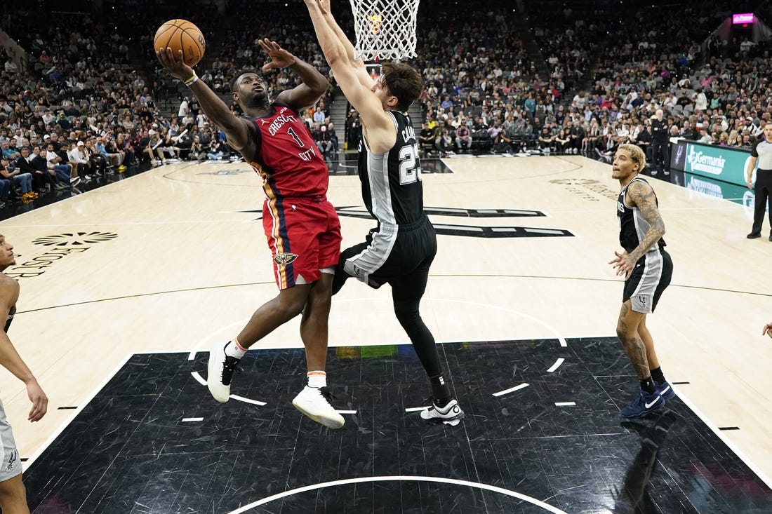 Feb 2, 2024; San Antonio, Texas, USA; New Orleans Pelicans forward Zion Williamson (1) shoots over San Antonio Spurs center Zach Collins (23) during the second half at Frost Bank Center. Mandatory Credit: Scott Wachter-USA TODAY Sports