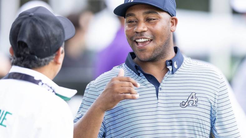 Feb 3, 2024; Playa del Carmen, Quintana Roo, MEX; Team Aces player Harold Varner III with local Mayakoba caddie David  Tukan  before the second round of the LIV Golf Mayakoba tournament at El Chamaleon Golf Course. Mandatory Credit: Erich Schlegel-USA TODAY Sports