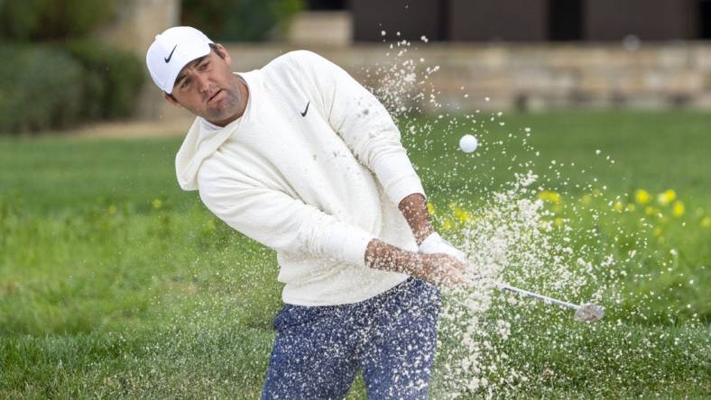 February 3, 2024; Pebble Beach, California, USA; Scottie Scheffler hits his bunker shot on the second hole during the third round of the AT&T Pebble Beach Pro-Am golf tournament at Pebble Beach Golf Links. Mandatory Credit: Kyle Terada-USA TODAY Sports