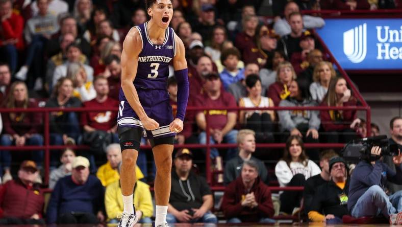 Feb 3, 2024; Minneapolis, Minnesota, USA; Northwestern Wildcats guard Ty Berry (3) celebrates his three-point basket against the Minnesota Golden Gophers during the first half at Williams Arena. Mandatory Credit: Matt Krohn-USA TODAY Sports