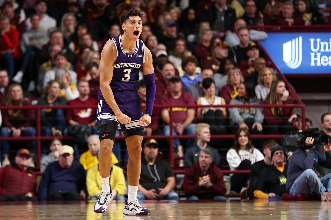 Feb 3, 2024; Minneapolis, Minnesota, USA; Northwestern Wildcats guard Ty Berry (3) celebrates his three-point basket against the Minnesota Golden Gophers during the first half at Williams Arena. Mandatory Credit: Matt Krohn-USA TODAY Sports