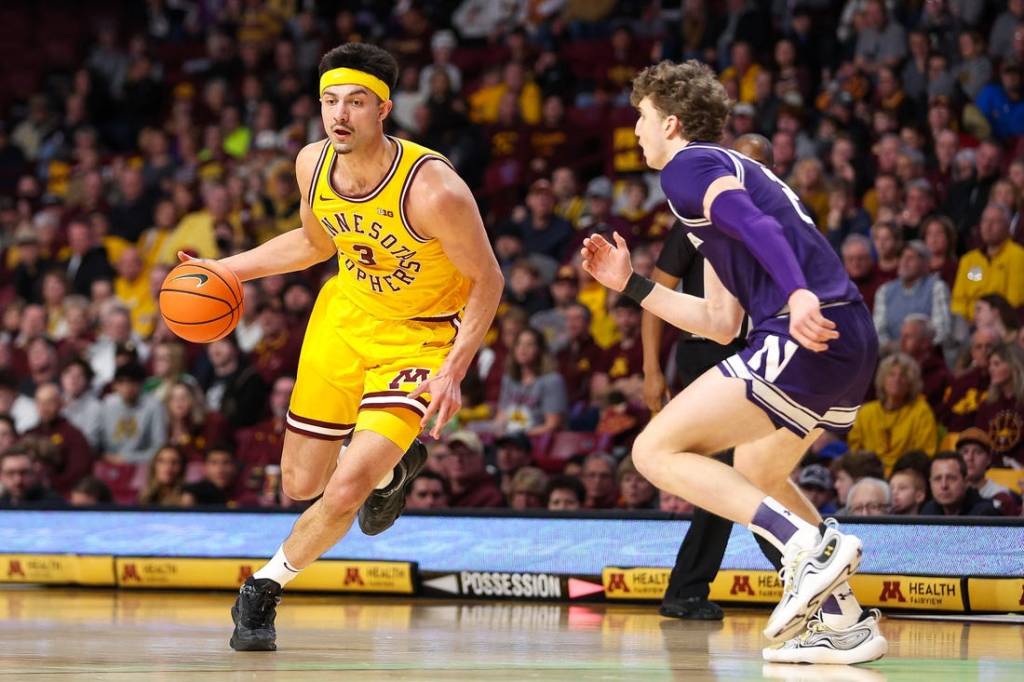 Feb 3, 2024; Minneapolis, Minnesota, USA; Minnesota Golden Gophers forward Dawson Garcia (3) works around Northwestern Wildcats forward Nick Martinelli (2) during the first half at Williams Arena. Mandatory Credit: Matt Krohn-USA TODAY Sports