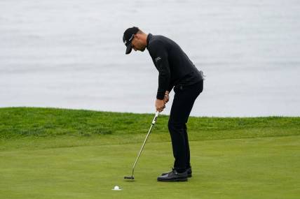 Feb 3, 2024; Pebble Beach, California, USA; Wyndham Clark putts on the fifth hole during the third round of the AT&T Pebble Beach Pro-Am golf tournament at Pebble Beach Golf Links. Mandatory Credit: Michael Madrid-USA TODAY Sports