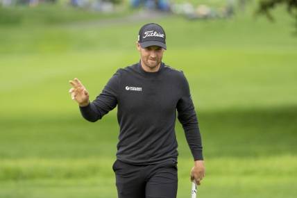 February 3, 2024; Pebble Beach, California, USA; Wyndham Clark acknowledges the crowd after making his putt on the second hole during the third round of the AT&T Pebble Beach Pro-Am golf tournament at Pebble Beach Golf Links. Mandatory Credit: Kyle Terada-USA TODAY Sports