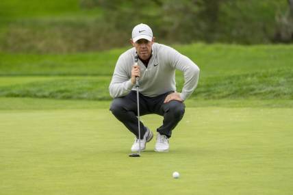 February 3, 2024; Pebble Beach, California, USA; Rory McIlroy lines up his putt on the second hole during the third round of the AT&T Pebble Beach Pro-Am golf tournament at Pebble Beach Golf Links. Mandatory Credit: Kyle Terada-USA TODAY Sports
