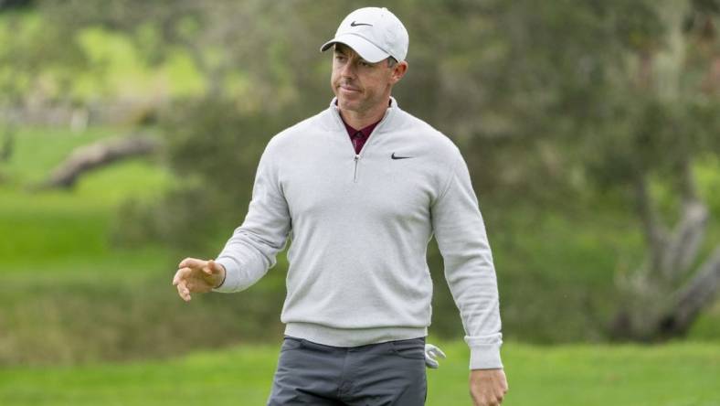 February 3, 2024; Pebble Beach, California, USA; Rory McIlroy acknowledges the crowd after making his putt on the second hole during the third round of the AT&T Pebble Beach Pro-Am golf tournament at Pebble Beach Golf Links. Mandatory Credit: Kyle Terada-USA TODAY Sports