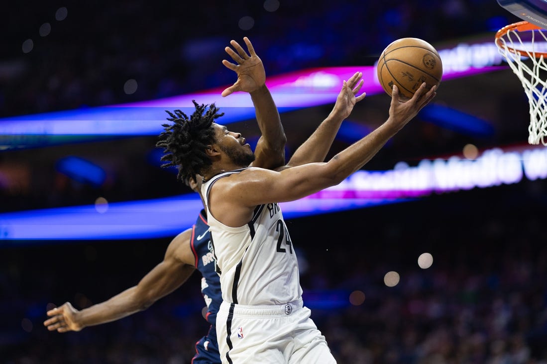 Feb 3, 2024; Philadelphia, Pennsylvania, USA; Brooklyn Nets guard Cam Thomas (24) scores against the Philadelphia 76ers during the third quarter at Wells Fargo Center. Mandatory Credit: Bill Streicher-USA TODAY Sports