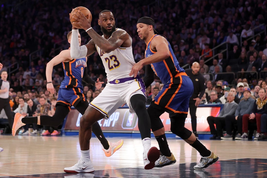 Feb 3, 2024; New York, New York, USA; Los Angeles Lakers forward LeBron James (23) drives to the basket against New York Knicks guard Josh Hart (3) during the first quarter at Madison Square Garden. Mandatory Credit: Brad Penner-USA TODAY Sports