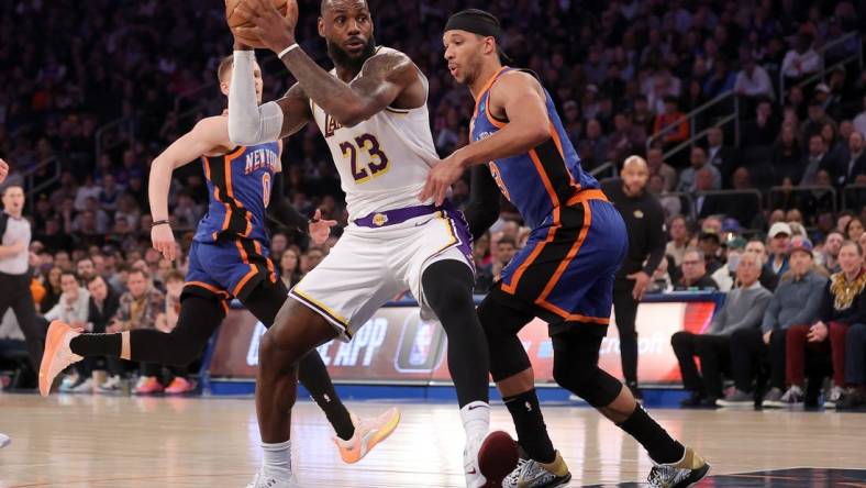 Feb 3, 2024; New York, New York, USA; Los Angeles Lakers forward LeBron James (23) drives to the basket against New York Knicks guard Josh Hart (3) during the first quarter at Madison Square Garden. Mandatory Credit: Brad Penner-USA TODAY Sports