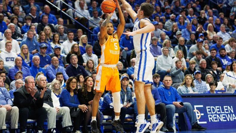 Feb 3, 2024; Lexington, Kentucky, USA; Tennessee Volunteers guard Zakai Zeigler (5) makes a three point basket during the first half against the Kentucky Wildcats at Rupp Arena at Central Bank Center. Mandatory Credit: Jordan Prather-USA TODAY Sports