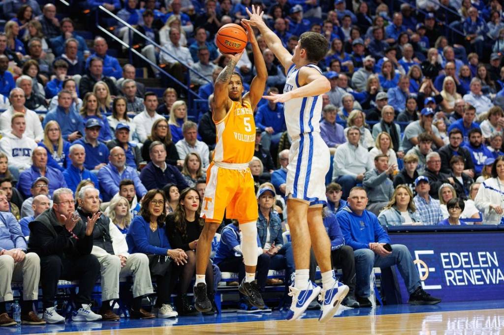 Feb 3, 2024; Lexington, Kentucky, USA; Tennessee Volunteers guard Zakai Zeigler (5) makes a three point basket during the first half against the Kentucky Wildcats at Rupp Arena at Central Bank Center. Mandatory Credit: Jordan Prather-USA TODAY Sports