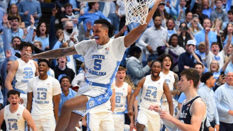 Feb 3, 2024; Chapel Hill, North Carolina, USA; North Carolina Tar Heels forward Armando Bacot (5) scores in the second half at Dean E. Smith Center. Mandatory Credit: Bob Donnan-USA TODAY Sports