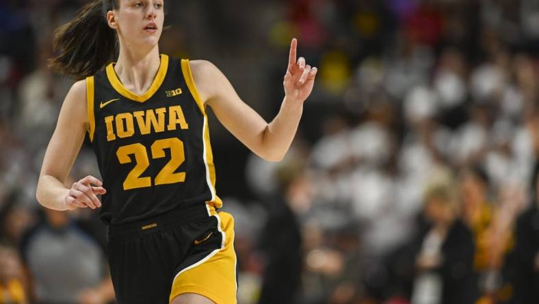 Feb 3, 2024; College Park, Maryland, USA;  Iowa Hawkeyes guard Caitlin Clark (22) reacts after making a three point basket during the second half against the Maryland Terrapins at Xfinity Center. Mandatory Credit: Tommy Gilligan-USA TODAY Sports