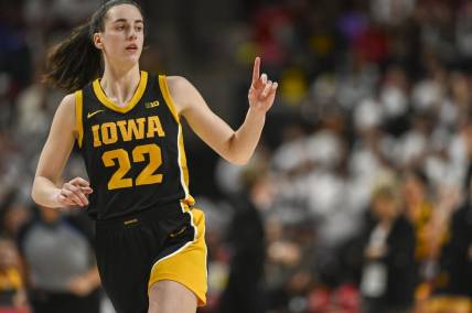 Feb 3, 2024; College Park, Maryland, USA;  Iowa Hawkeyes guard Caitlin Clark (22) reacts after making a three point basket during the second half against the Maryland Terrapins at Xfinity Center. Mandatory Credit: Tommy Gilligan-USA TODAY Sports