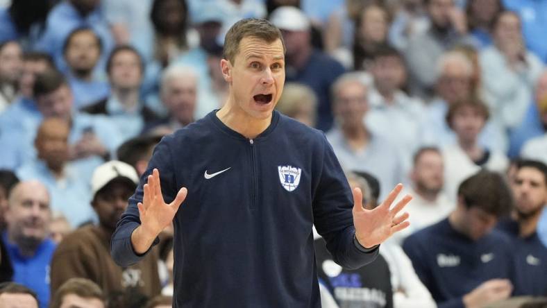 Feb 3, 2024; Chapel Hill, North Carolina, USA;  Duke Blue Devils head coach Jon Scheyer reacts in the second half at Dean E. Smith Center. Mandatory Credit: Bob Donnan-USA TODAY Sports