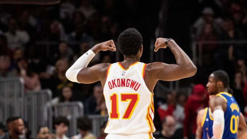 Feb 3, 2024; Atlanta, Georgia, USA; Atlanta Hawks forward Onyeka Okongwu (17) celebrates shot against Golden State Warriors during the third quarter at State Farm Arena. Mandatory Credit: Jordan Godfree-USA TODAY Sports